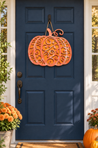 Orange epoxy scroll pumpkin door hanger on a navy front door, fall porch decor from a Rise and Shine Gifts epoxy workshop in Dothan, Alabama SHINE-WS-002