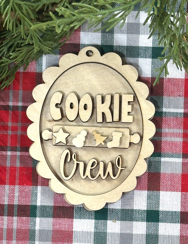 Unpainted layered wood Cookie Crew scalloped Christmas ornament with rolling pin and cookie cutter shapes, from Rise and Shine Gifts in Dothan, Alabama SHINE-OR-015