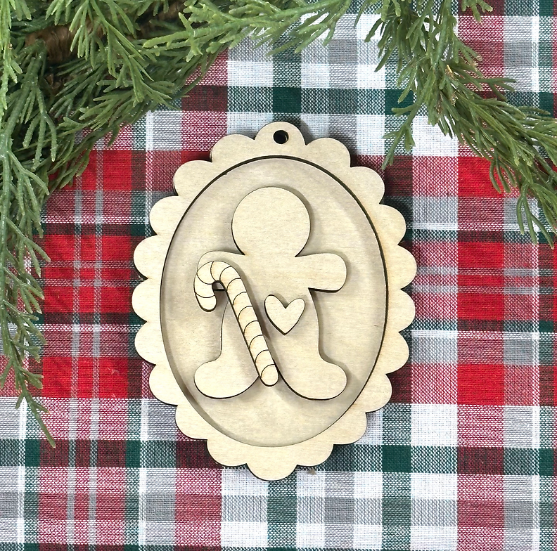 Unpainted layered wood gingerbread man with candy cane and heart scalloped Christmas ornament, from Rise and Shine Gifts in Dothan, Alabama SHINE-OR-017