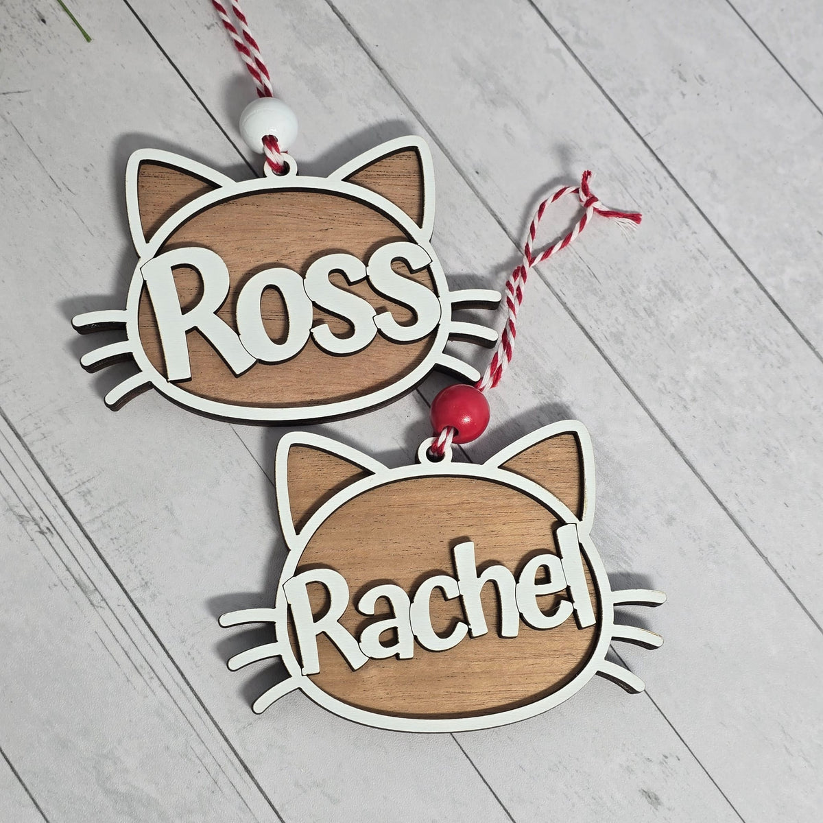 Personalized cat name layered wood Christmas ornament, cut by Rise and Shine Gifts in Dothan, Alabama OR-038