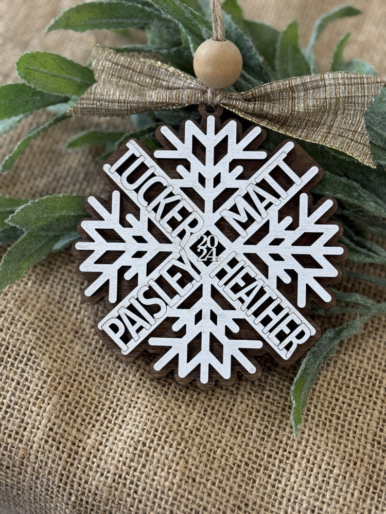 Personalized snowflake family names layered wood Christmas ornament with year, cut by Rise and Shine Gifts in Dothan, Alabama OR-033