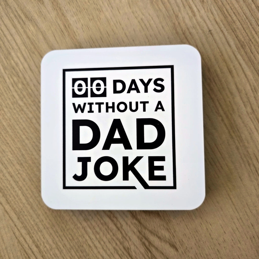 "00 Days Without a Dad Joke" funny dad coaster with cork back, UV printed by Rise and Shine Gifts in Dothan, Alabama SHINE-CS-001
