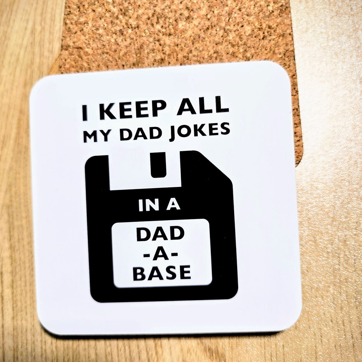 "I Keep All My Dad Jokes in a Dad-a-Base" funny dad coaster with cork back, UV printed by Rise and Shine Gifts in Dothan, Alabama SHINE-CS-001