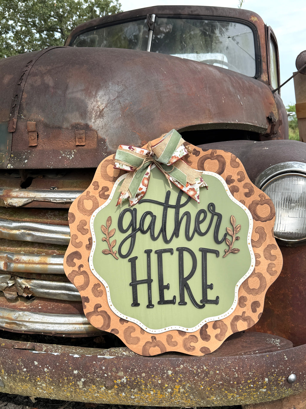 Gather Here pumpkin leopard fall door hanger, layered wood scalloped front door sign with fall bow, handmade by Rise and Shine Gifts in Dothan, Alabama - SHINE-DH-009