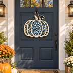 Blue epoxy scroll pumpkin door hanger on a navy front door with fall mums, made at a Rise and Shine Gifts epoxy workshop in Dothan, Alabama SHINE-WS-002