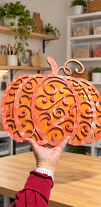 Orange epoxy scroll pumpkin held in the studio, custom mica resin color, epoxy workshop by Rise and Shine Gifts in Dothan, Alabama SHINE-WS-002