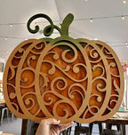 Copper-orange epoxy scroll pumpkin door hanger with 3D laser-cut scroll layer, epoxy workshop by Rise and Shine Gifts in Dothan, Alabama SHINE-WS-002